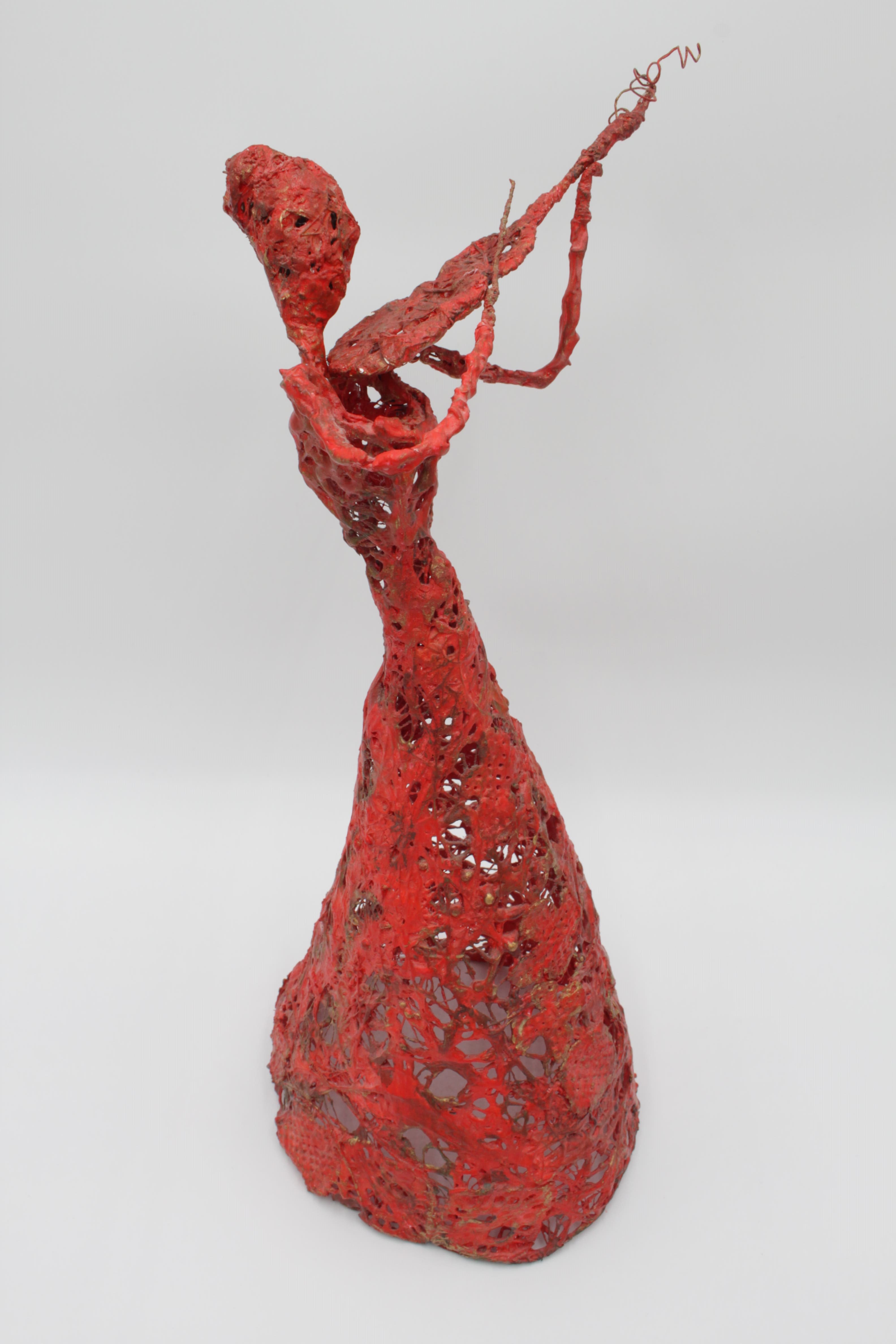 Photo de la sculpture violoncelliste